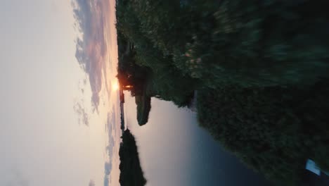 fpv drone view of sunset on bytynskie lake in poland