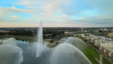 large fountain in a river.
