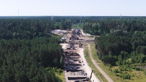 construction site of rail baltica bridge, aerial view