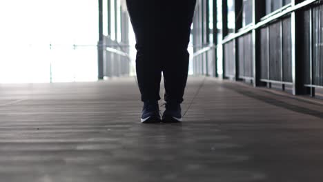 continuous jump rope exercise in an indoor corridor