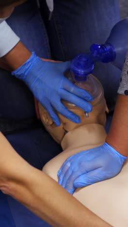 medical doll for training students. educational dummy with oxygen mask. concept of medical education and practice. vertical video