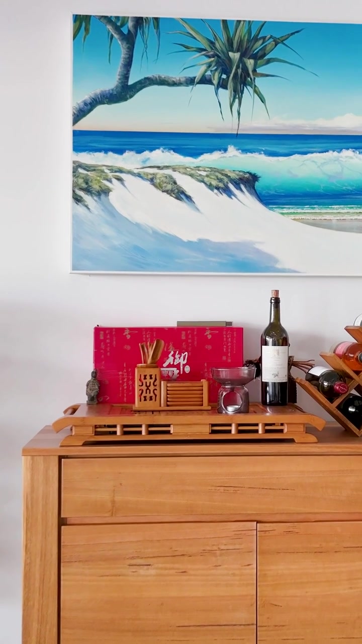 Modern interior featuring beach-themed artwork