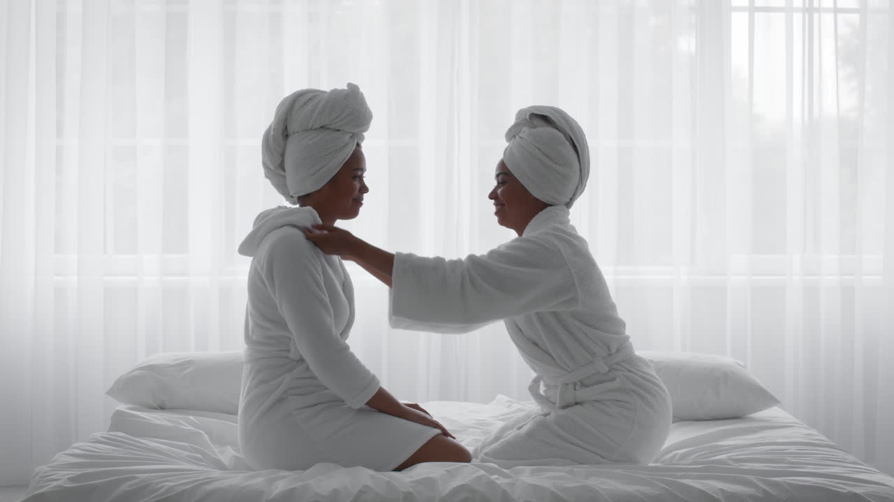 Sisters Relaxing and Giving Each Other a Massage