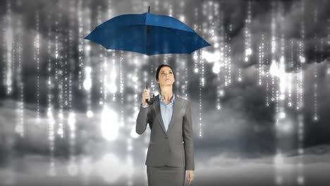 composite image of businesswoman holding an umbrella