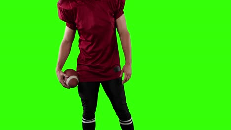 American-football-player-on-green-screen-background.