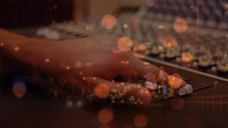 animation of blurred night road traffic over hands of caucasian male dj on concert