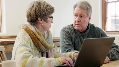 Senior couple, discussion and laptop for budget