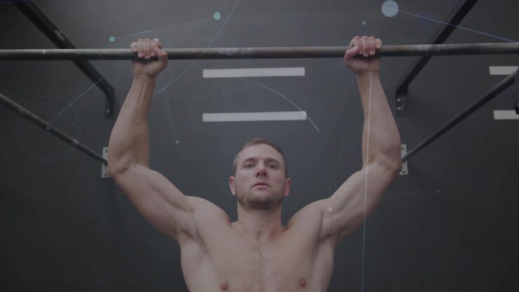 Gripping bar, shirtless man doing pull-ups on rig for fitness, light flares showing wall marks