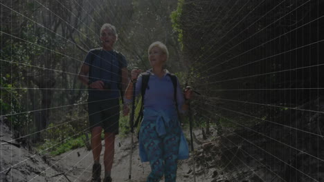 senior couple hiking along forest trail, displaying fitness data through animated heart rate graph