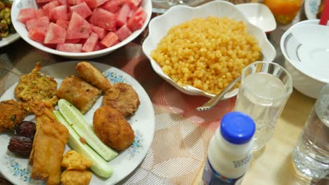 high angle view of iftar on plate on table during ramadan