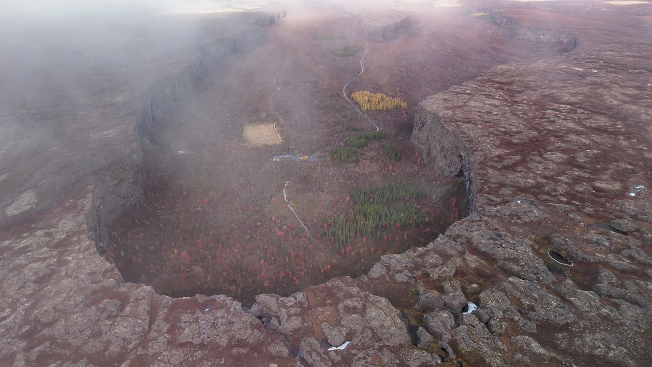 Aerial top down shot of famous Asbyrgi ravine during cloudy day. Icelandic attraction for tourism. glacial canyon in Iceland.