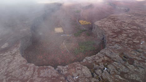aerial top down shot of famous asbyrgi ravine during cloudy day. icelandic attraction for tourism. glacial canyon in iceland.