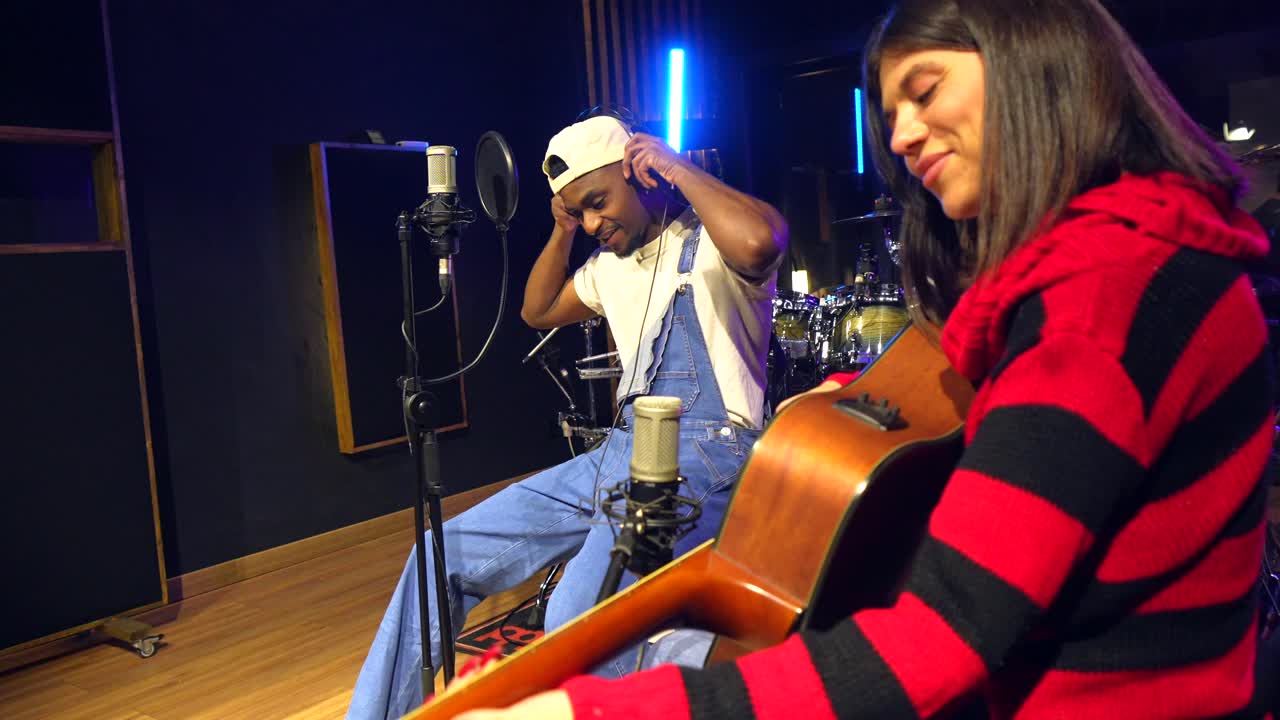 Musicians Recording a Song in Music Studio