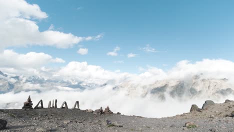 mountain summit view with cairns