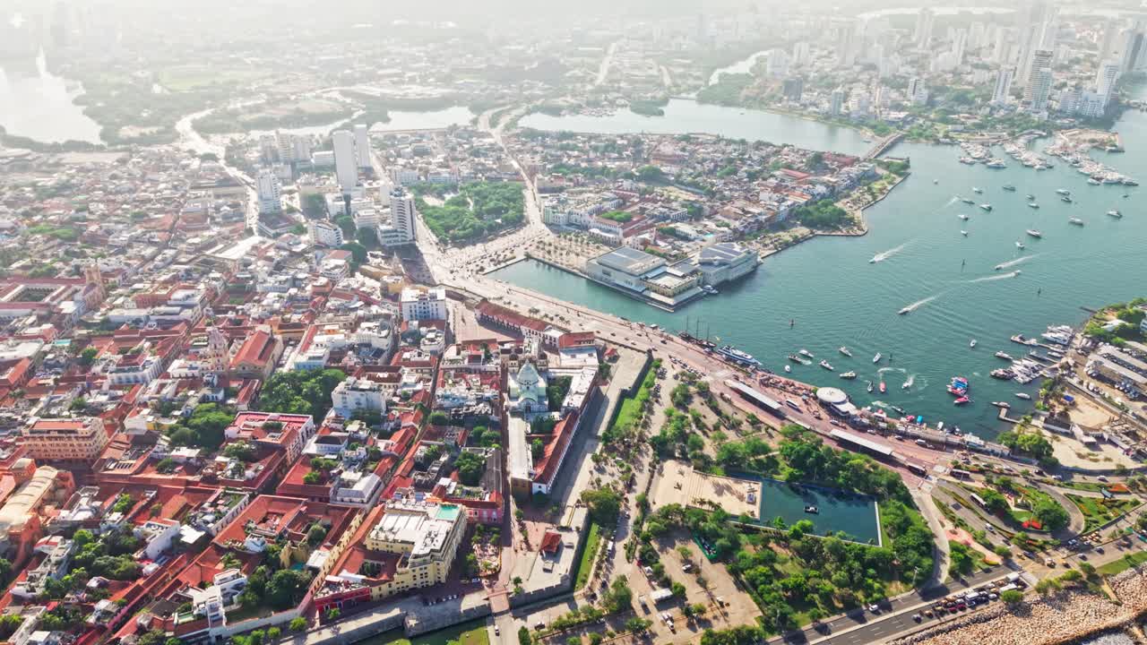 Slow motion aerial view of cartagena, colombia, showcasing bocagrande and castillo san felipe