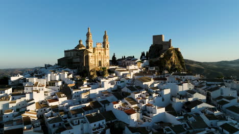 hilltop town of olvera with catholic church and a fortress in cã¡diz, andalusia, spain