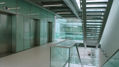 empty modern office hallway, horizontal panning shot