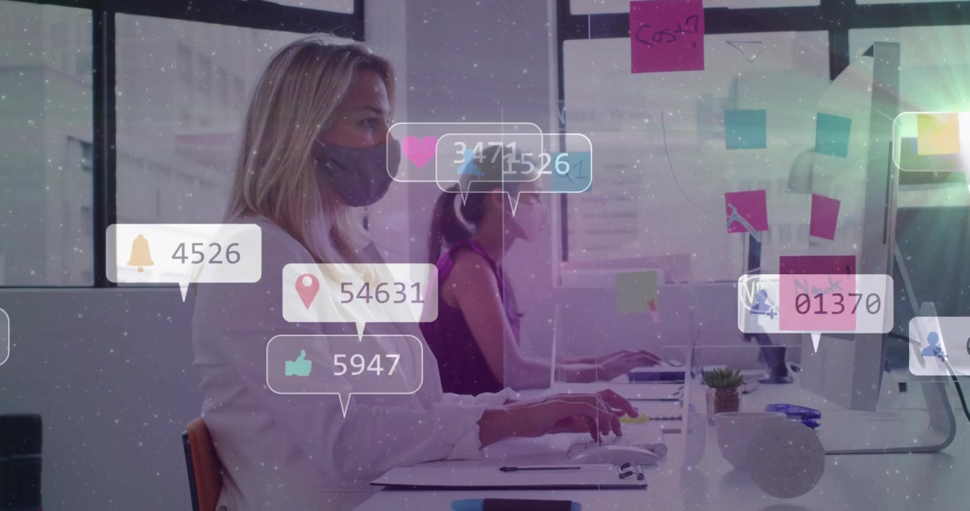 Marketing duo typing at desks, keyboard input spawning floating alert bubbles across monitors