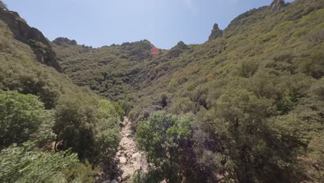 Breathtaking-aerial-FPV-view-of-stunning-Gorges-d'Héric-winding-path-of-gorge