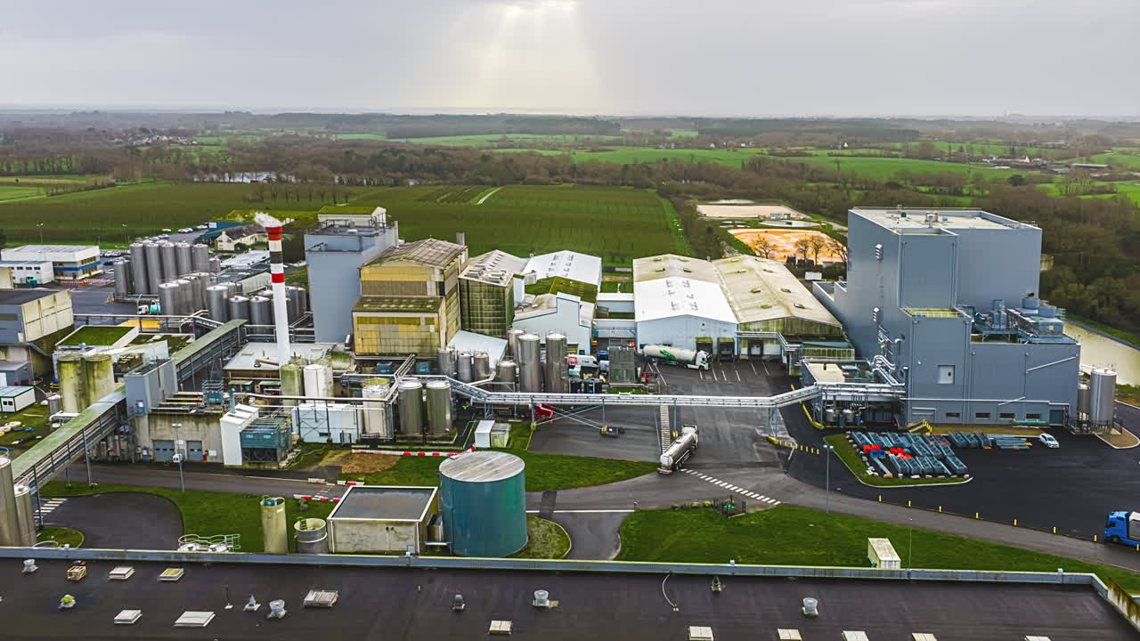 Large Industrial Processing Facility In Rural Landscape. Hyperlapse