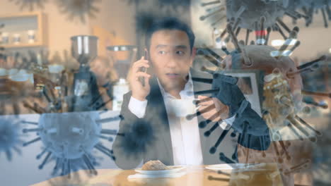 animation of macro coronavirus covid-19 cells spreading over caucasian man talking on the phone