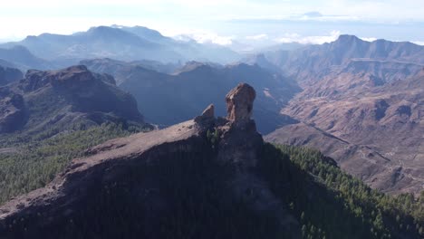 Flight-over-of-Roque-Nublo,-a-volcanic-rock-in-caldera-of-Tejeda,-Gran-Canaria,-Canary-islands,-Spain