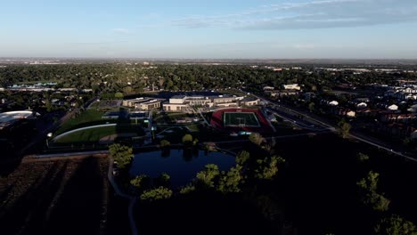 greeley west high school establishing shot golden hour drone video 4k. 2024.