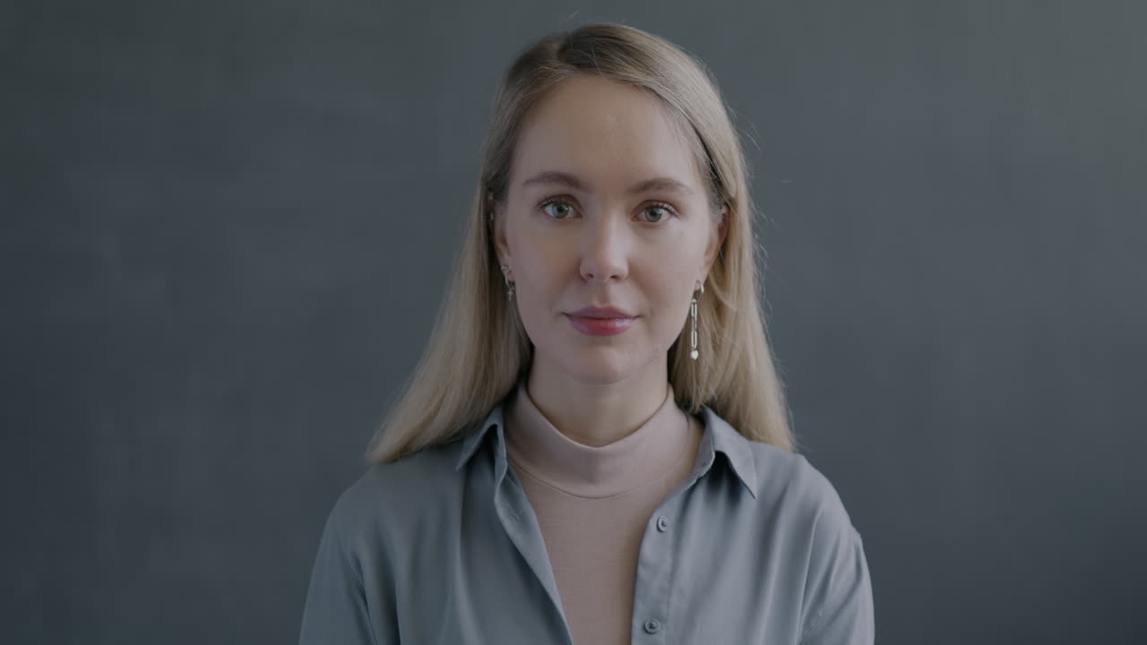 Woman smiling and waving