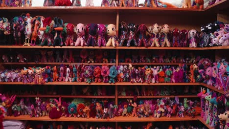 Vivid-Colors-Of-Hand-Made-Stuffed-Toys-At-The-Souvenir-Shops-In-San-Cristobal-de-Las-Casas-In-Chiapas,-Mexico