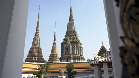 slow motion establishing shot of the beautiful architecture of the emerald buddha temple