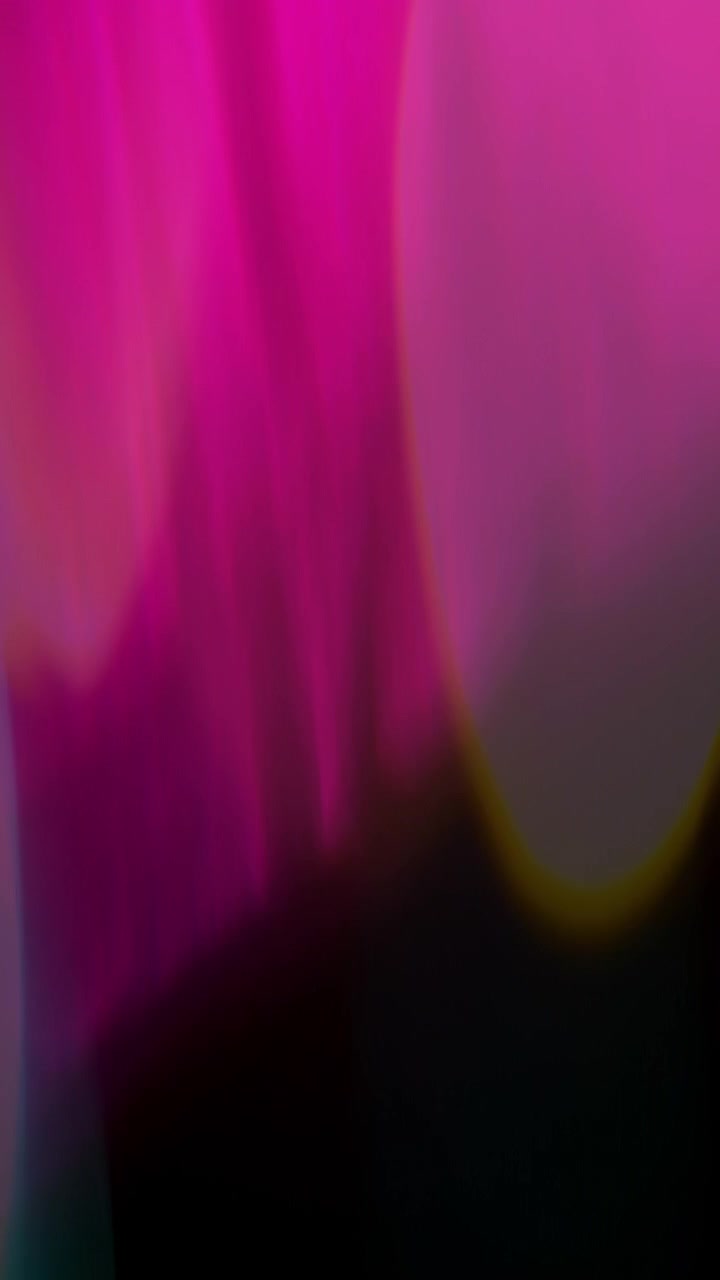 Abstract Motion Background with Soft Pink and Teal Light Leaks