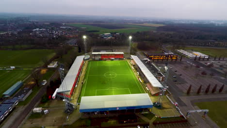 Flying-over-soccer-field-with-players-practicing