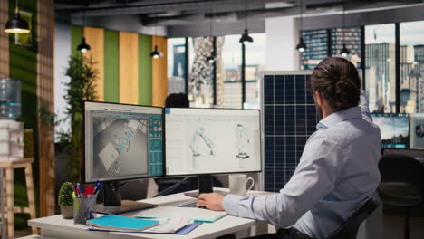 sustainability rd expert uses cad program on pc to design solar panels