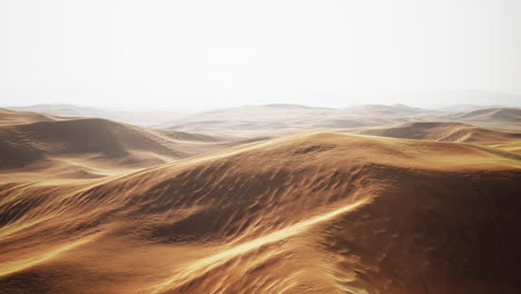 beautiful sunset over sand dunes of sahara desert in morocco