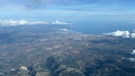 aerial panoramic view of palma de mallorca, spain, recorded from a jet cabin during a left turn while flying at 3000m high