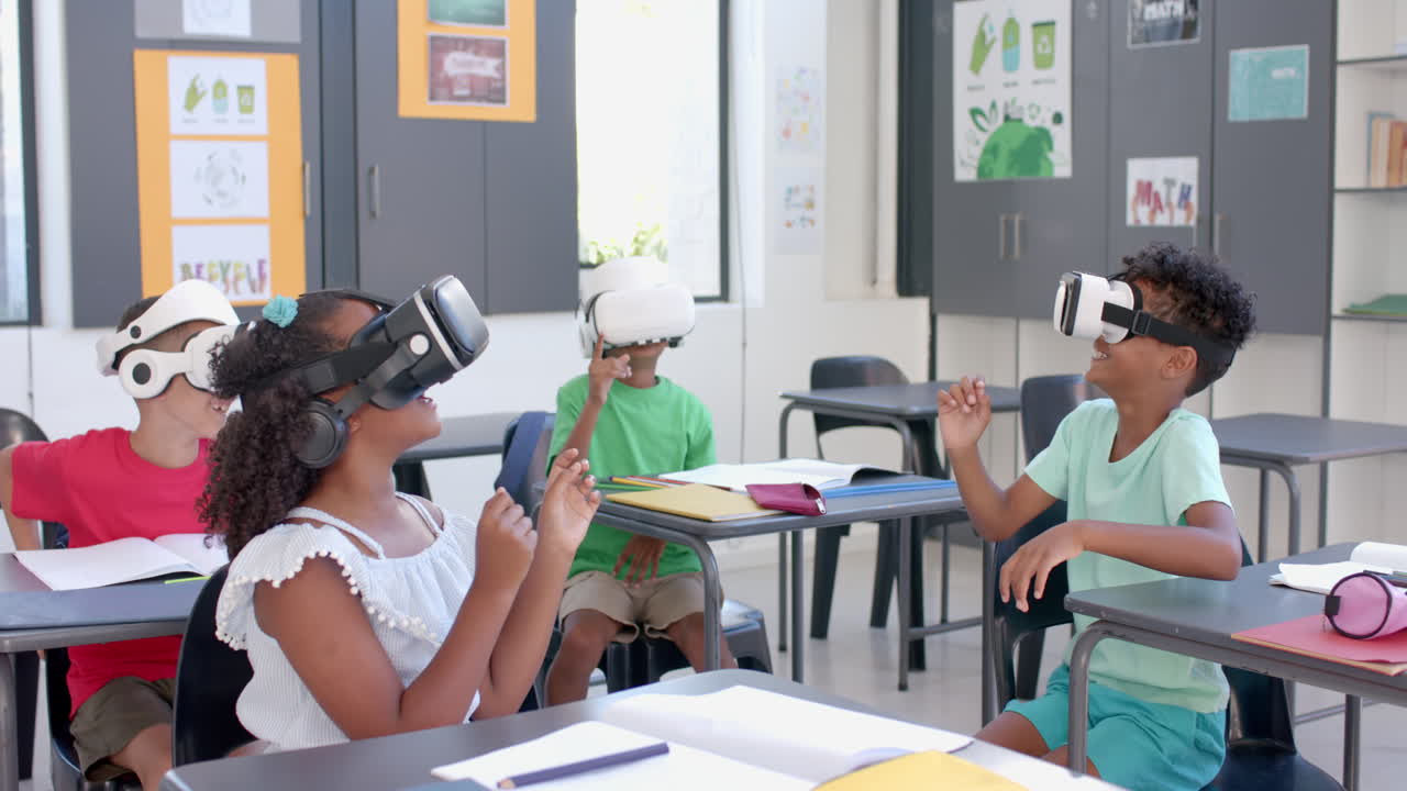 Biracial students explore virtual reality in a school, with copy space