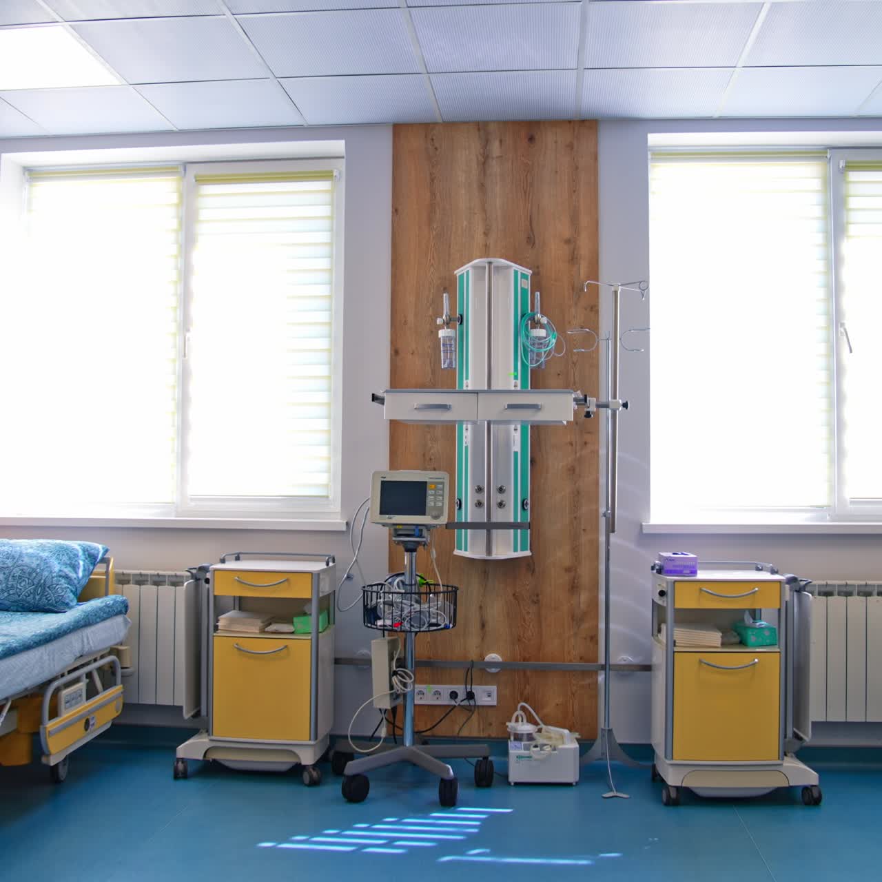 Comfortable postpartum intensive care unit for two patients. Well-equipped ward in modern maternity hospital