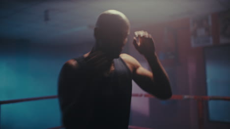 Male Boxer Training in a Gym