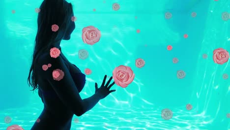 Animation-of-roses-falling-over-biracial-woman-looking-at-water