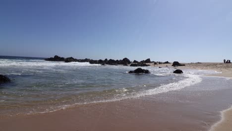 waves at an angle in tunquen beach chile