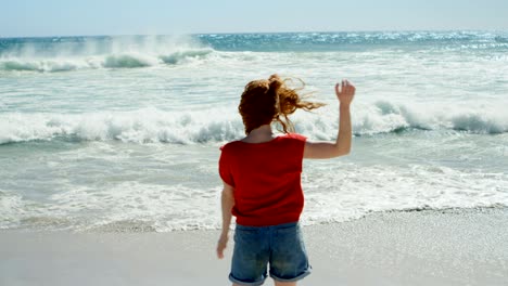 carefree woman enjoying on the beach 4k