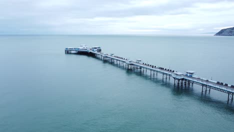 llandudno pier historic victorian wooden boardwalk seaside landmark aerial view descending to ocean