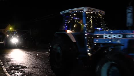 flashing your lights to the christmas tractors, festive hope tractor run, horseman's green, whitchurch, united kingdom