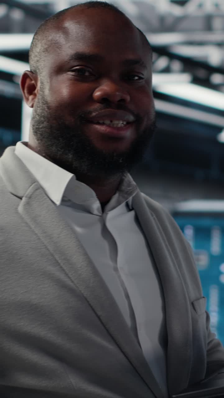 Vertical video Data center engineer deploying AI driven management tools using laptop