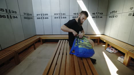 man preparing to leave the locker room