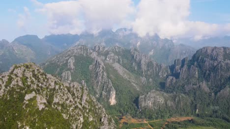 Aerial-View-Of-Vegetation-On-Karst-Limestone-Cliffs-In-Vang-Vieng,-Laos