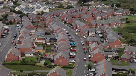 aerial view across port of holyhead suburban town neighbourhood brick house property in north wales