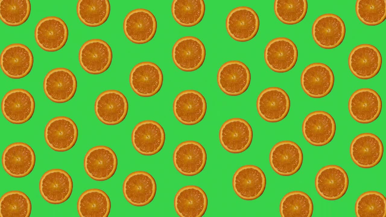 animación brillante de naranjas en un fondo verde
