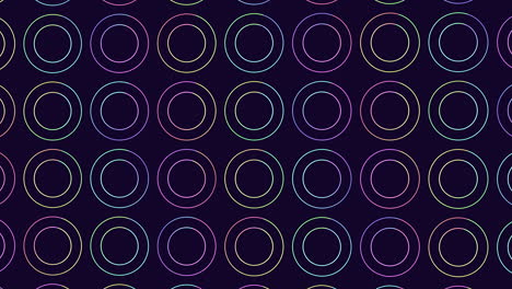 Circular-dreams-seamless-pattern-of-purple-and-blue-circles-on-a-dark-background