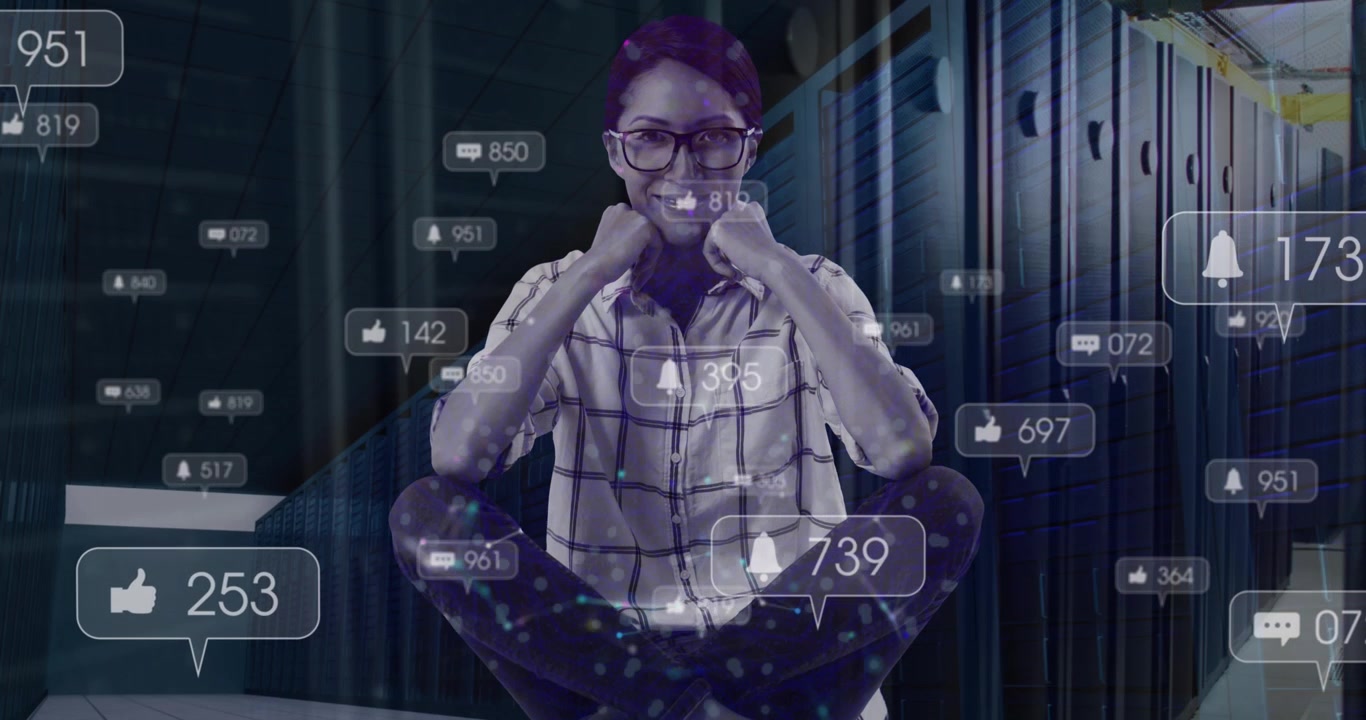 Animation of social media icons over woman smiling against computer server room
